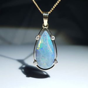 Natural opal evening sky 10k gold pendant