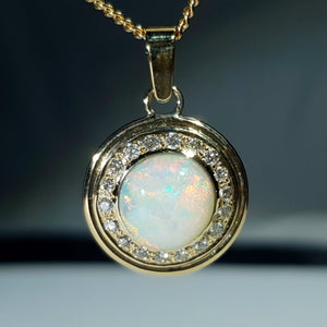 Natural opal swirling magic 10k gold pendant