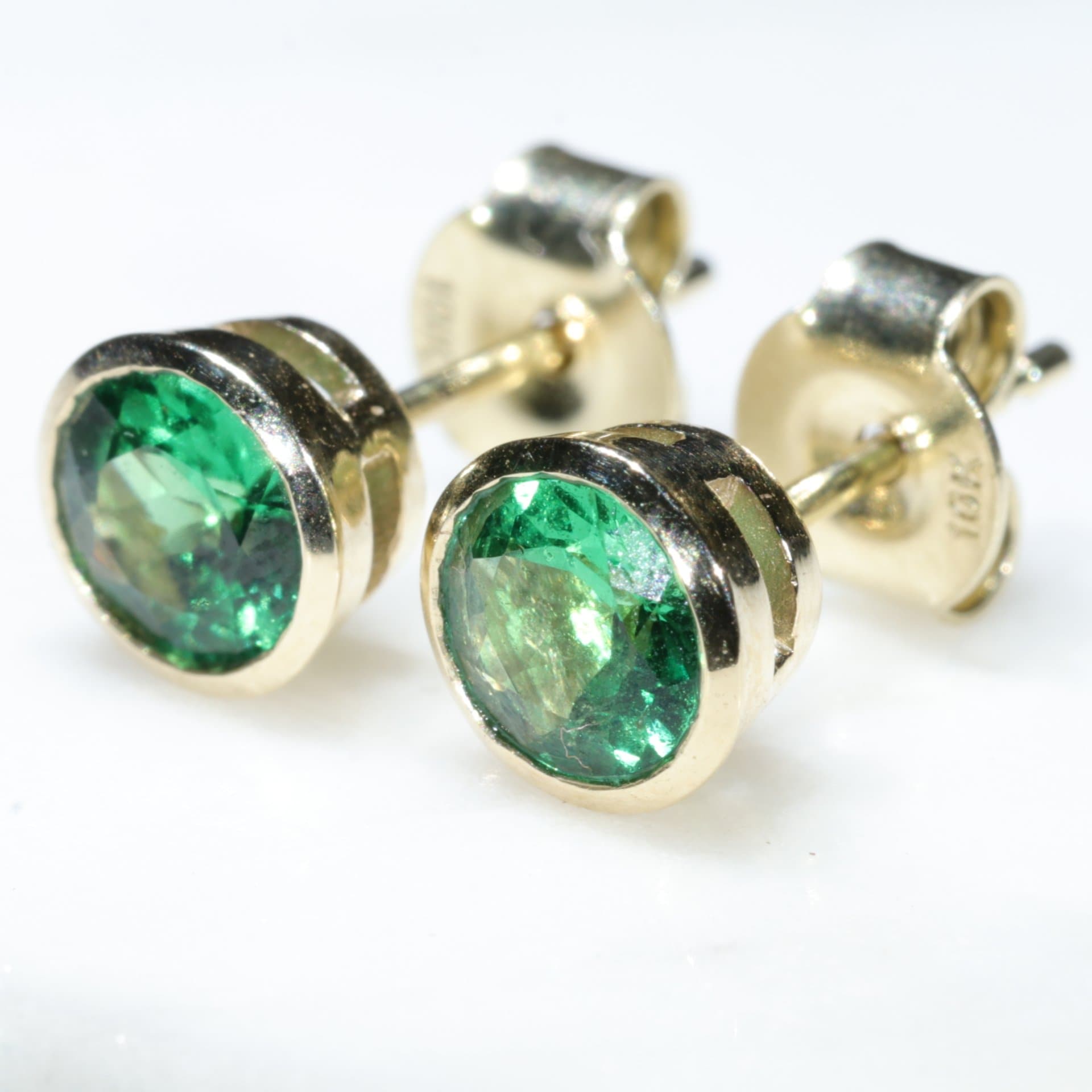 Green stone hot sale gold studs